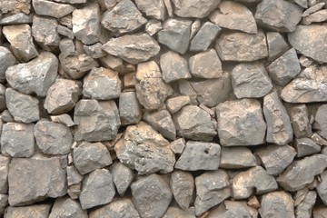 Rough natural drystone wall. Texture detail close up.