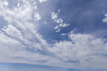 Clouds in a blue sky great for sky swaps and backgrounds