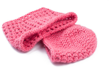 Pink woolen hat isolated on white background.Copy space