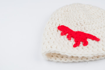 White woolen hat isolated on white background.Copy space