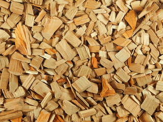 Natural texture of wood chips for smoking or gardening. Lumber, sawdust background.