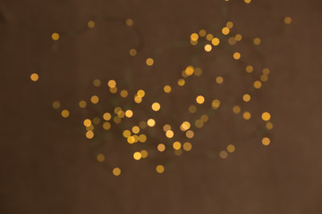 Abstract pasting circular gold luxury gold glitter bokeh lights background. Magic background. Holiday. An explosion of Golden confetti. Golden Christmas abstract texture of grainy.