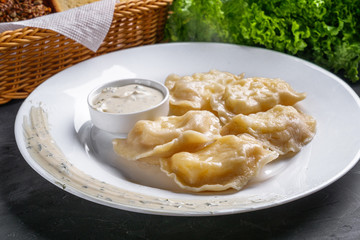traditional Ukrainian dish of dumplings with sour cream
