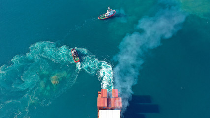 Aerial drone photo of industrial Cargo Container carrier tanker ship cruising Mediterranean open...