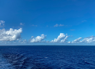 The Holland America Line Zuiderdam cruise ship sailing away from the private island of Half Moon Cay