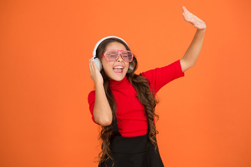 dancing with favorite song. school radio dj. small happy girl listen music in headphones. funny...
