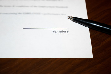 Legal contract signing - buy sell real estate contract