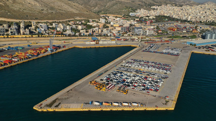 Aerial drone photo of industrial cargo container terminal near Perama and commercial port of...