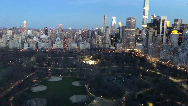 The contrast between Central Park and the Skycrapers