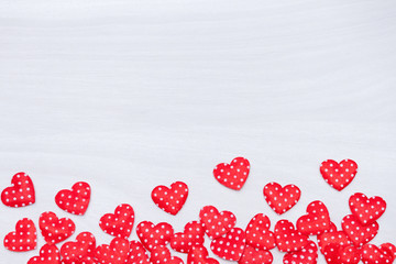 Valentine's day background. Red hearts on white wooden background. Valentines Day, love, wedding concept. Flat lay, top view.