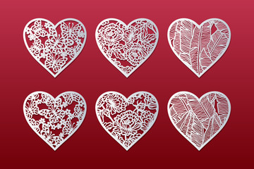 Fototapeta na wymiar Laser cut hearts set with pattern of peonies, butterflies, flowers. Templates for interior design, layouts wedding cards, invitations, Valentine's Day cards. Vector floral hearts.