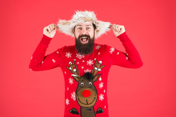 having fun. hipster with beard in favorite sweater. knitwear and fur accessory. happy new year. merry christmas. male winter fashion. feel happiness about holidays. wear warm clothes in cold season