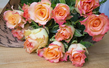 One pink rose on a pink background. Festive rose from a tropical garden. a lot of space for your text