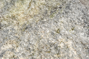 Texture of natural marble-like white limestone from Parainen Lime Stone Quarry, the largest open-pit mine in Finland.