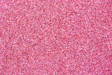 Fototapeta premium Shiny pink glitter textured empty christmas card, party or happy new year background with copy space