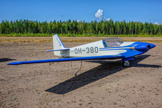 Single-seater aerobatic motor glider Fournier RF4D OH-380 parked on Karhula aviation museum airshow. Kotka, Finland.