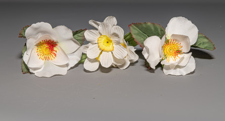 Fototapeta na wymiar isolated artificial flowers