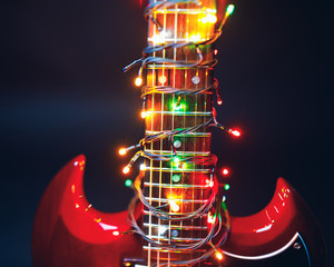 abstract guitar with festive Christmas lights