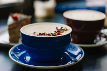 Two cups of coffe with latte art.