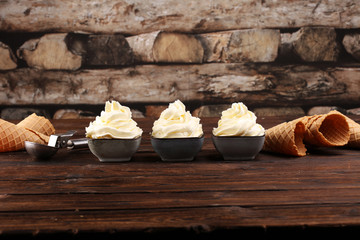 Vanilla soft served ice cream tasty sundae dairy ice cream on rustic background
