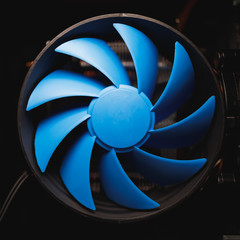 blue cpu cooler inside PC case