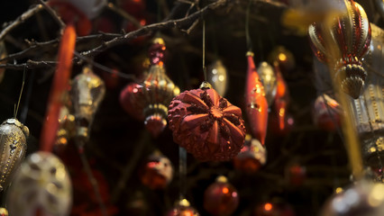 Christmas decorations hanging on ribbon