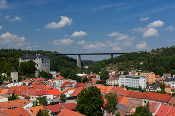 Velke Mezirici cityscape with the castle and highway bridge, Czech Republic