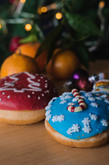 Christmas cakes on the table with tangerines