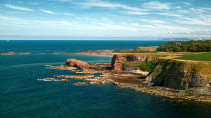 Beautiful Scotland landscape of the sea bay and rocks, Oxroad Bay, East Lothian, Scotland, United Kingdom