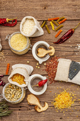 Zero waste food shopping concept. Cereals, pasta, legumes, dried mushrooms, spices. Sustainable lifestyle, old wooden boards background