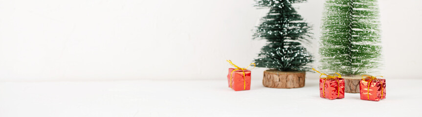 Small gift boxes under Christmas tree