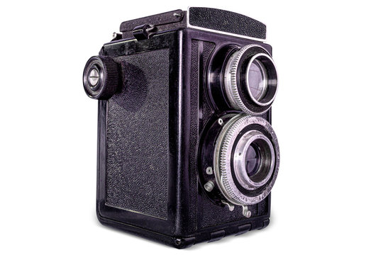 Old black camera on white background, isolated.
