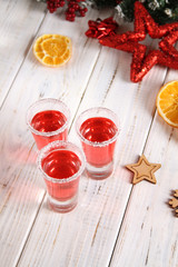Christmas drink red in glass glasses.