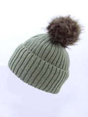 Light green woolen winter hat hat with POM POM pompom isolated on white