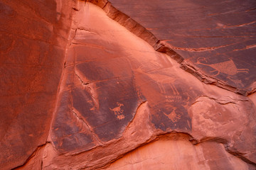 Fototapeta na wymiar Ancient Petroglyphs in rock in Monument Valley, Utah