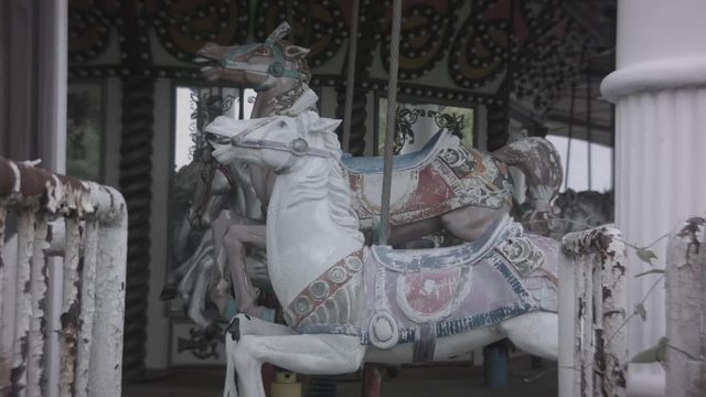 Old carousel in abandoned theme park
