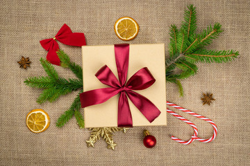 Xmas Background. Christmas decoration isolated on linen texture. Gold New years balls. Holiday festive celebration concept