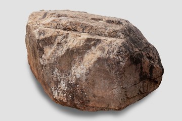 Big stone Rock isolated on white background. Close up and selective focus.