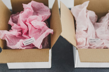 original product vs dupe imitation label inside delivery parcel boxes from online purchaseswith...