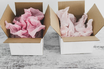competition concept, delivery parcel boxes side by side with slightly different colors symbol of...