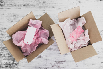 competition concept, delivery parcel boxes side by side with slightly different colors symbol of...