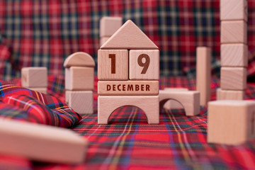 December 19 written with wooden blocks