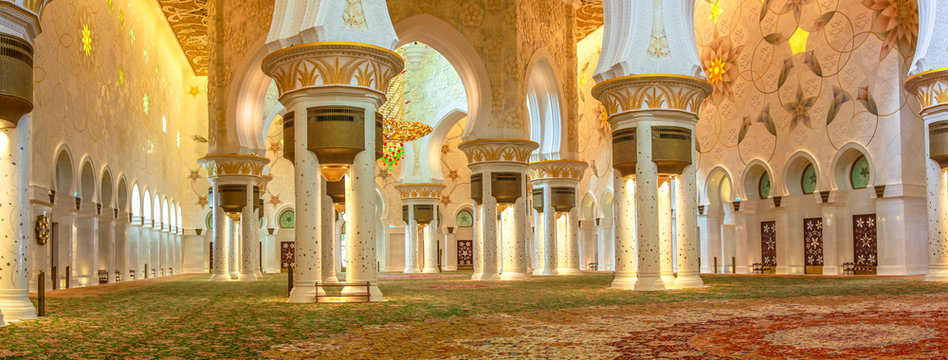 Abu Dhabi, UAE - April 22, 2013: panorama of the Main Prayer Hall in the Grand Mosque Sheikh Zayed, United Arab Emirates.The carpet is the world's largest carpet designed by Iranian artist Ali Khaliqi