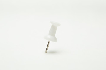 Close up of White pin  on white background