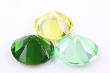 Yellow and green diamond on a white background
