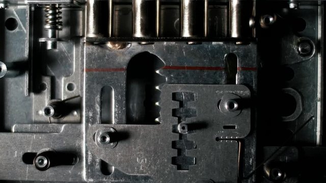 The internal mechanism of the metal lock that opens the door and opens and unlocks the keyless gate