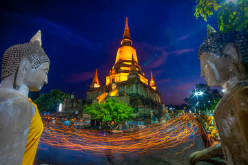 Unidentified Buddhists making candle light procession