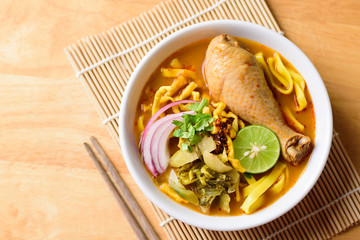 Northern Thai food (Khao Soi Kai), spicy egg noodles soup with chicken