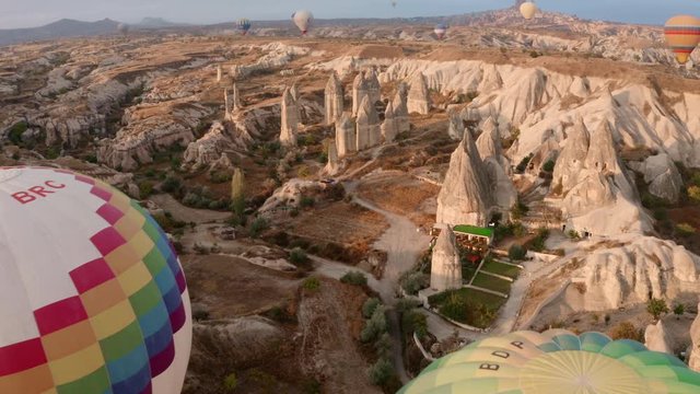 Cappadocia, tourists fly in balloons. Like a frame from a movie