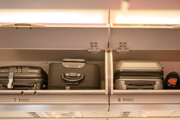 Overhead compartment for put luggage on airplane.